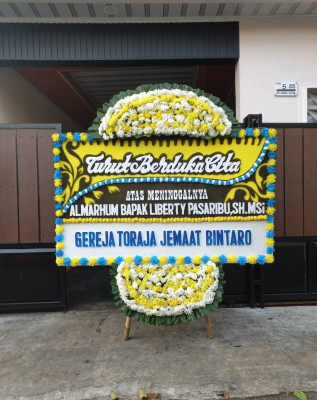 Papan Bunga Duka di Hager